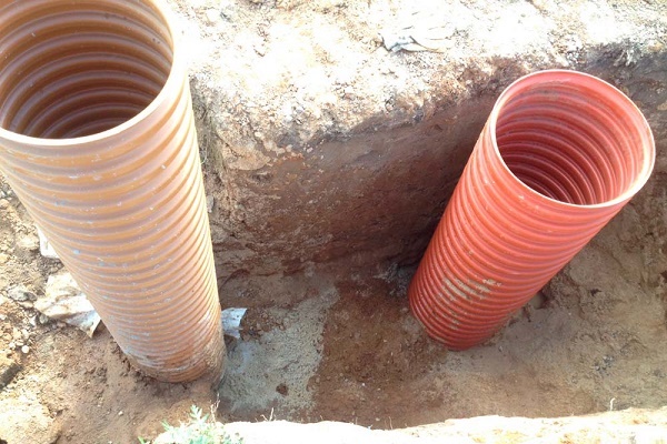 Plastic wells for drainage: types, how to choose, installation rules