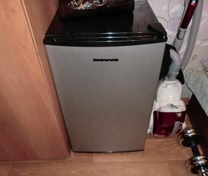 Fridge fits easily in a small communal room