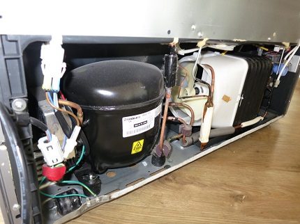 Sānu kompresors ar Side-by-Side ledusskapi
